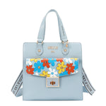 Our  Blue Floral Pop Tote Bag with strap set on a  white background 