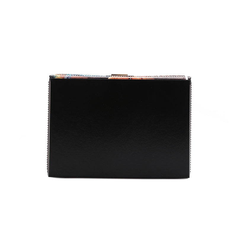THE BOTTOM PART HAS BLACK VEGAN LEATHER.