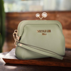 OUR NICOLE LEE  ELSIE PEARL COIN PURSE IN OUR SAGE DESIGN  SET IN A MODERN BACKGROUND