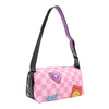 Back view of Our Nail Polish shoulder Bag with heart and smiley face details on with Pink checkered background.