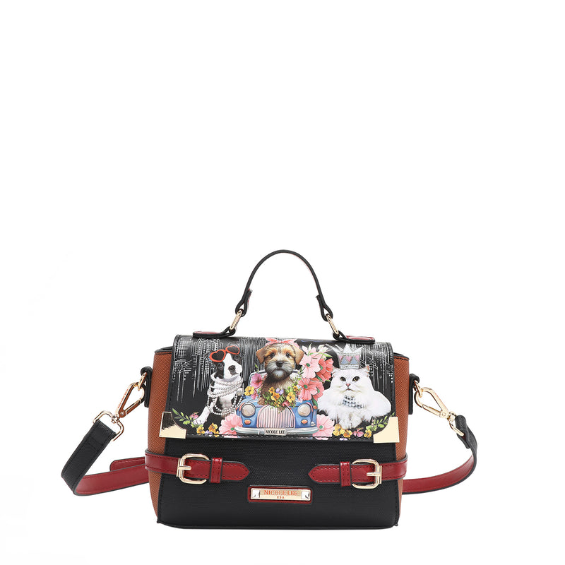 Nicole Lee Family Yearbook crossbody with optional strap attached, part of the Family Yearbook 3-in-1 set! A playful design that’s perfect for any occasion with a fun mix of dogs and cats stylishly dressed in flowers and pearls with a city scape line drawing background.