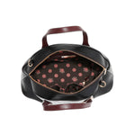 Interior of vegan leather Ladies Night Out dome shaped handbag part of LADIES NIGHT OUT 3 PIECE SET (Handbag, Crossbody, Wallet). Dome shaped zip handbag with dual top handles and side D-rings for optional crossbody strap attachment. Polka dot interior lining in brown and pink with multiple interior pockets for storage and organization and key strap to attach keys.