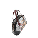 Top angle of vegan leather Ladies Night Out dome shaped handbag part of LADIES NIGHT OUT 3 PIECE SET (Handbag, Crossbody, Wallet). Dome shaped zip handbag with dual top handles and side D-rings for optional crossbody strap attachment. Two stylish ladies getting ready to go out with coffee in their hands and chic, fashionable outfits. 
