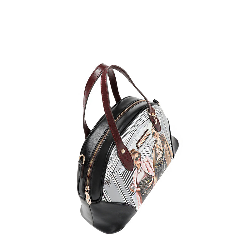 Top angle of vegan leather Ladies Night Out dome shaped handbag part of LADIES NIGHT OUT 3 PIECE SET (Handbag, Crossbody, Wallet). Dome shaped zip handbag with dual top handles and side D-rings for optional crossbody strap attachment. Two stylish ladies getting ready to go out with coffee in their hands and chic, fashionable outfits. 