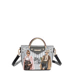 Vegan leather Ladies Night Out crossbody with top handle and optional, adjustable crossbody strap part of LADIES NIGHT OUT 3 PIECE SET (Handbag, Crossbody, Wallet). Two stylish ladies getting ready to go out with coffee in their hands and chic, fashionable outfits. 