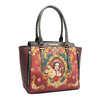 Front angle of the Queen vegan leather structured handbag with dual top handles, part of THE QUEEN 3 PIECE SET (Handbag, Crossbody, Wallet). Side zip pocket details with tassel zipper pulls and a captivating and stunning baroque-inspired print of a style queen fit for the royal family.