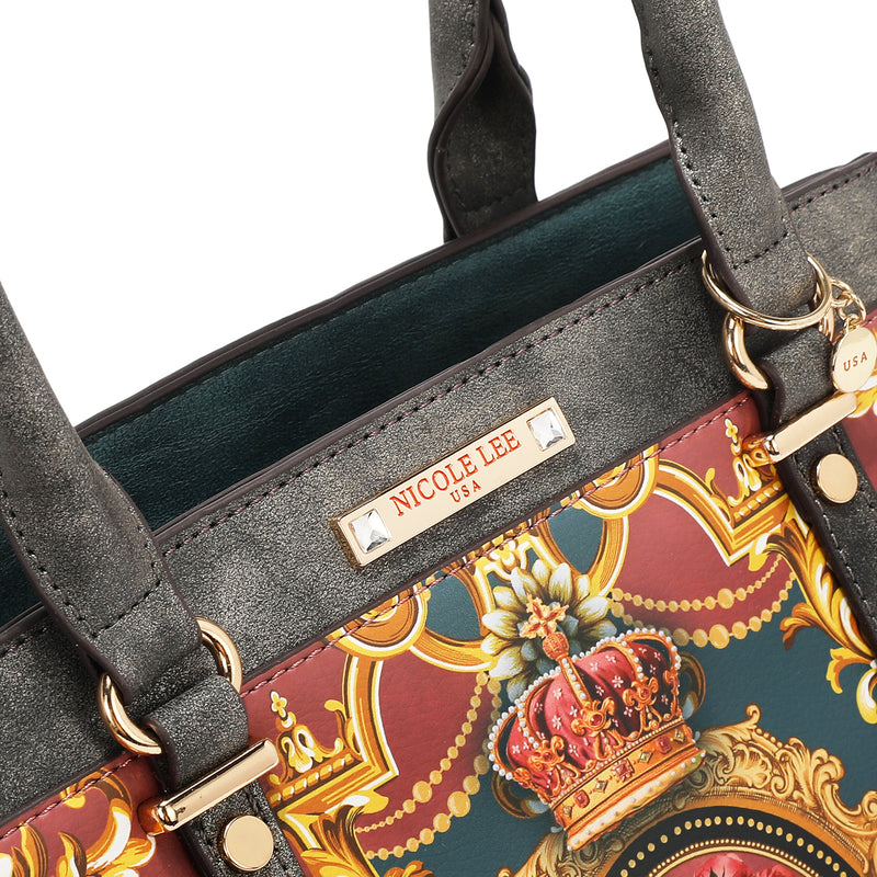 Up close angle of the Queen vegan leather structured handbag with dual top handles, part of THE QUEEN 3 PIECE SET (Handbag, Crossbody, Wallet). A captivating and stunning baroque-inspired print fit for the royal family. Gold-tone logo  engraved nameplate with diamond rhinestones. 