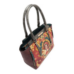 Top angle of the large Queen vegan leather structured handbag with dual top handles, part of THE QUEEN 3 PIECE SET (Handbag, Crossbody, Wallet). Burgundy red solid back with metallic gray handles for a pop of shimmer and elegance.