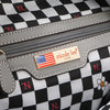 Nicole Lee vegan leather Violet Blossoms backpack part of the VIOLET BLOSSOM 3 PIECE SET (Backpack, Crossbody, Wallet) opens up to reveal a roomy black and white checker print polyester lining with back interior zip pocket with gray vegan leather accents and gold-tone logo engraved nameplate with America flag.