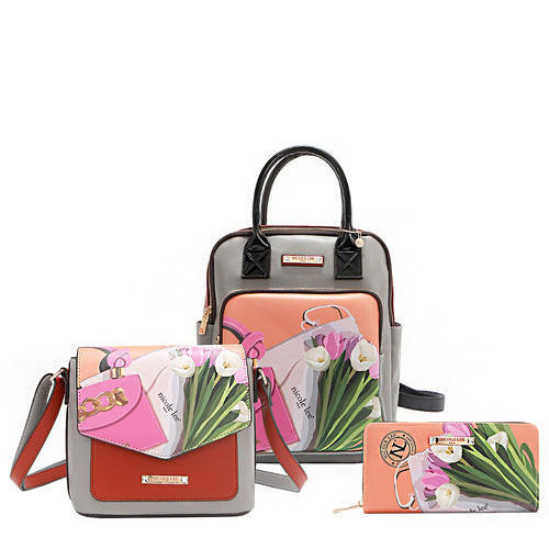 The Nicole Lee vegan leather 3-in-1 signature set now blooms in the Violet Blossom print, offering effortless versatility with a touch of elegance. This must-have set includes a spacious backpack, a chic flap crossbody, and a sleek zip wallet—each designed to nest perfectly inside the backpack. Wear them together or style them separately—the possibilities are endless.