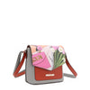 Front angle of the Nicole Lee vegan leather Violet Blossoms flap crossbody, part of the VIOLET BLOSSOM 3 PIECE SET (Backpack, Crossbody, Wallet). Illustration of pink and white tulips against a Nicole Lee branded dust bag and hot pink structured chain link bag. Adjustable shoulder strap and logo-engraved gold-tone nameplate with diamond rhinestones. 