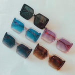 OUR COLLECTION OF OVERSIZED STUDDED SUNGLASSES IN 5 COLORS.
