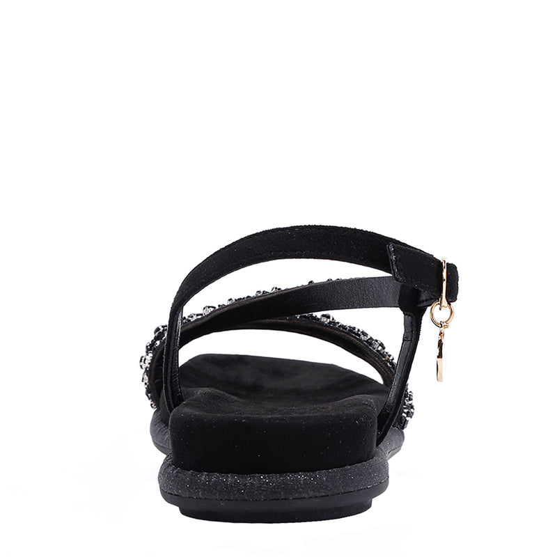 OUR DANI RHINESTONE SANDAL IN BLACK EMBELLISHED WITH A ADJUSTABLE BUCKLE CLOSURE. SUEDE UPPER AND INSOLE. OPEN TOE AND RUBBER OUTSOLE