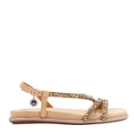 OUR DANI RHINESTONE SANDAL IN GOLD EMBELLISHED WITH A ADJUSTABLE BUCKLE CLOSURE WITH A NICOLE LEE CHARM FOR STATEMENT. SUEDE UPPER AND INSOLE. OPEN TOE AND RUBBER OUTSOLE