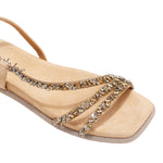 A CLOSER LOOK ON OUR DANI SANDAL. RHINESTONE ENCRUSTED CRISSCROSS STRAPS AND A MODERN SQUARE TO.