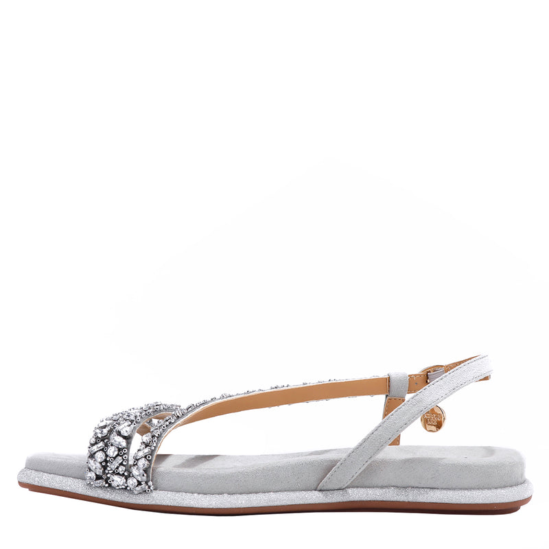 OUR DANI RHINESTONE SANDAL IN SILVER EMBELLISHED WITH A ADJUSTABLE BUCKLE CLOSURE WITH A NICOLE LEE CHARM FOR STATEMENT. SUEDE UPPER AND INSOLE. OPEN TOE AND RUBBER OUTSOLE