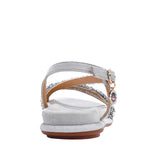 OUR DANI RHINESTONE SANDAL IN SILVER EMBELLISHED WITH A ADJUSTABLE BUCKLE CLOSURE. SUEDE UPPER AND INSOLE. OPEN TOE AND RUBBER OUTSOLE