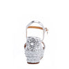 The platform  wedge is adorned with silver rhinestones and  braid detailing.