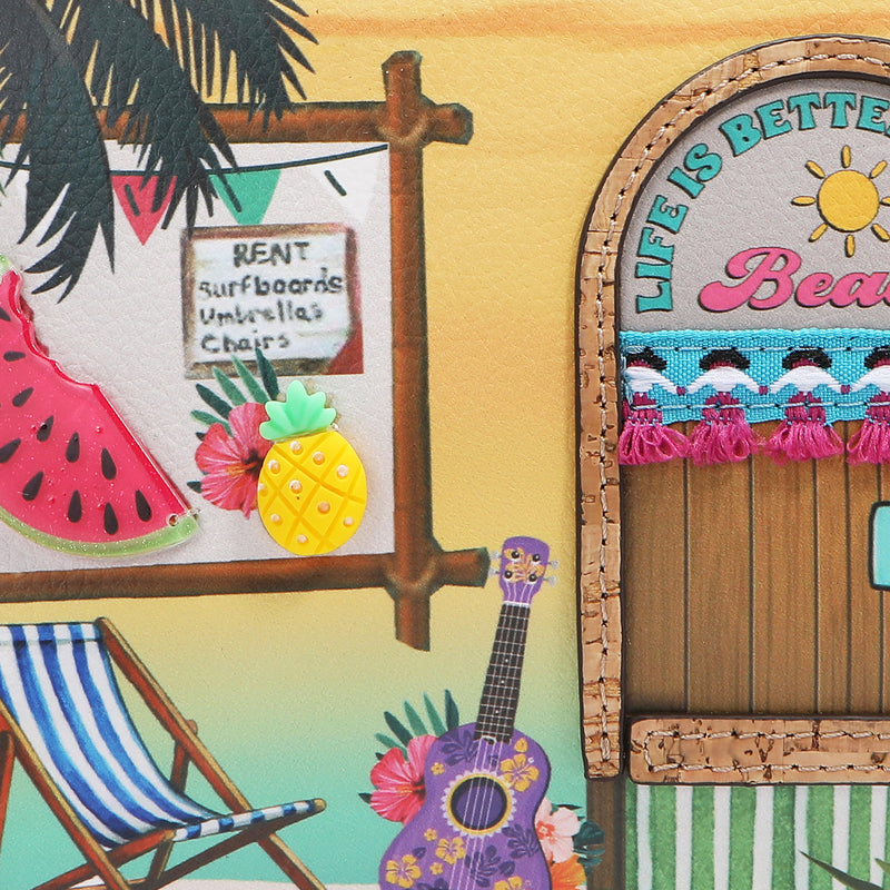 Our Sun and Sand Tropical-themed door with 'Life is Better at the Beach' sign, watermelon, pineapple, and deck chair.