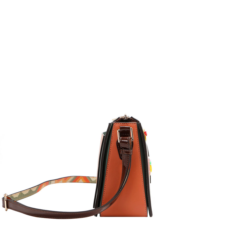 Our Nicole Lee Sun and Sand Crossbody bag , with strap.