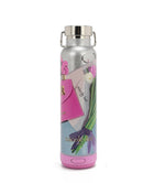 THE TUMBLER HAS A CYLINDRICAL SHAPE WITH A SCREW CAP. IN THE VIOLET BLOSSOM PRINT. IT HAS A SILVER GLITTER BACKGROUND. HAS THE IMAGE OF A PINK HANDBAG AND A BOUQUET OF WHITE, PINK, AND PURPLE TULIPS ALL AROUND. AT THE BOTTOM IS A PINK BLUETOOTH SPEAKER.